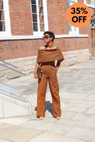 Makeda Orange Jumpsuit Women’s Dress