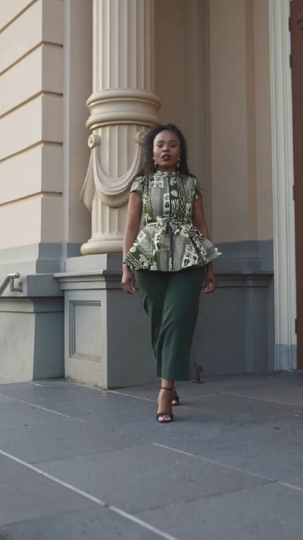 Tiwa Green Peplum Top