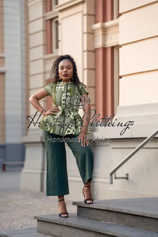 TIWA GREEN PEPLUM TOP Shirts & Tops