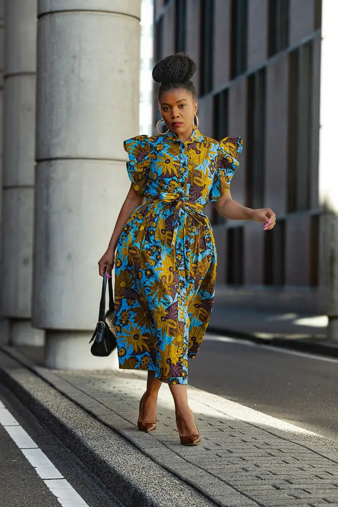 blue and yellow floral dress Zendaya Blue and Brown Floral Midi Dress